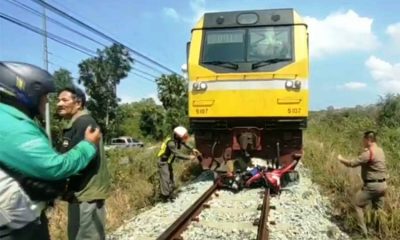 motorcycle hit by train in pattaya