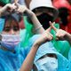 Thai Anti-Government Protesters Learn a Whole New Sign Language