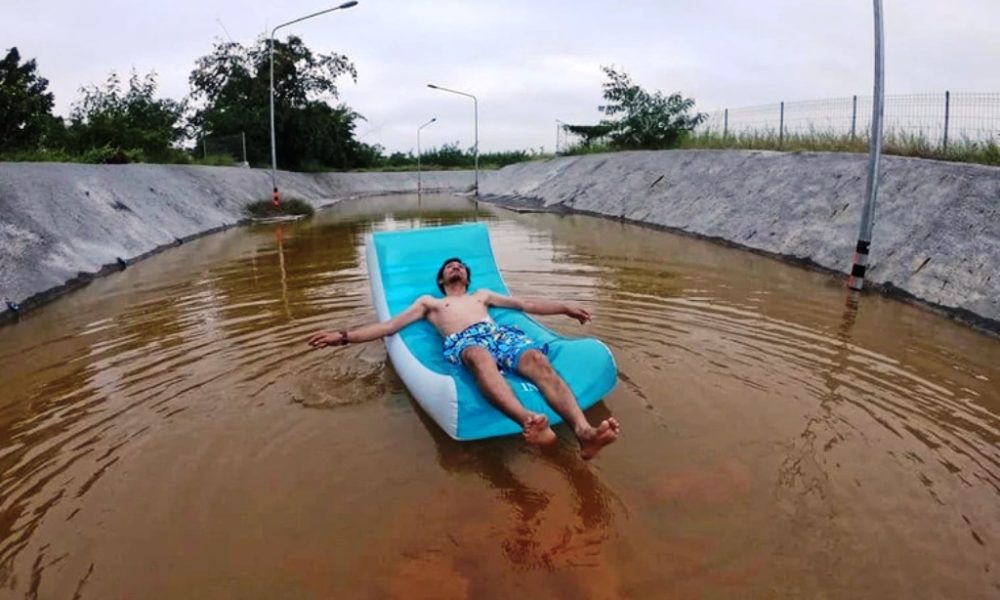 Locals Shame Thai State Railway to Drain Underpass Using Photo's