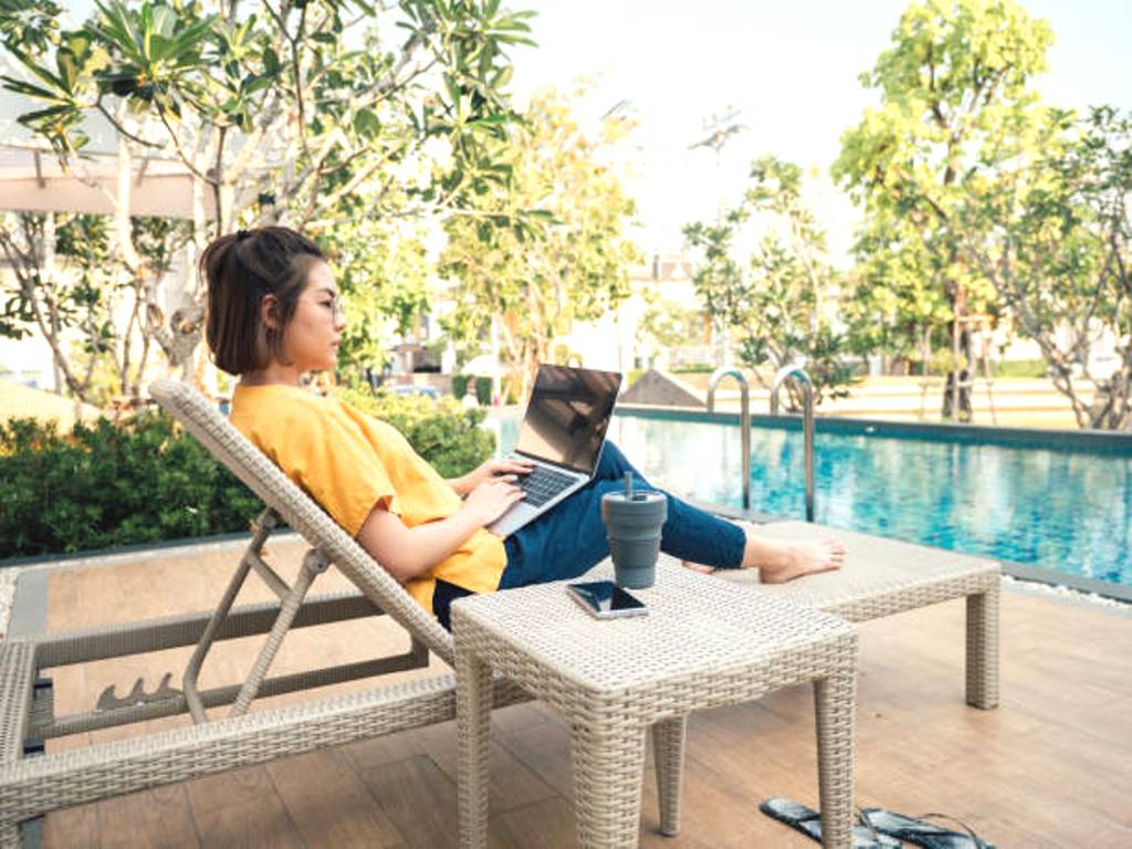 People Escaping Pandemic to Enjoying Summer on Patio Garden Sunloungers