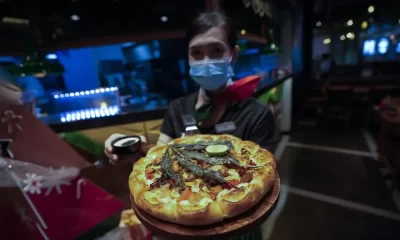 Food Chain in Thailand Promotes Cannabis Crazy Happy Pizza