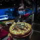 Food Chain in Thailand Promotes Cannabis Crazy Happy Pizza