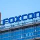 Apple Maker Foxconn Apologizes For Hiring Error At COVID-hit China Plant