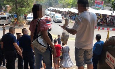 Foreigner Drinking Beer at Chiang Mai Temple