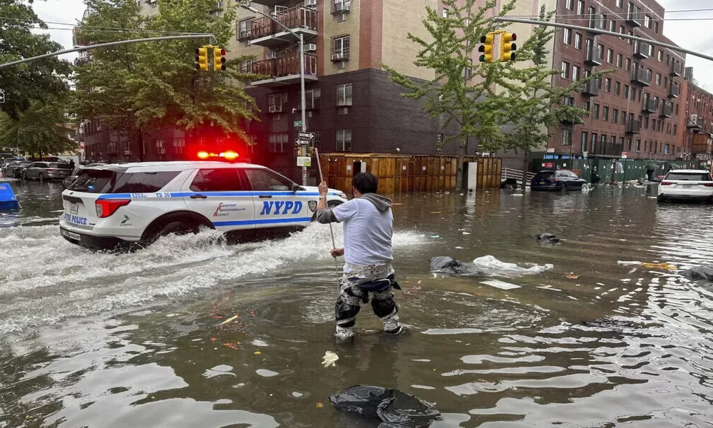 New York Gets One Of Its Wettest Days In Decades, as rain swamps subways and streets