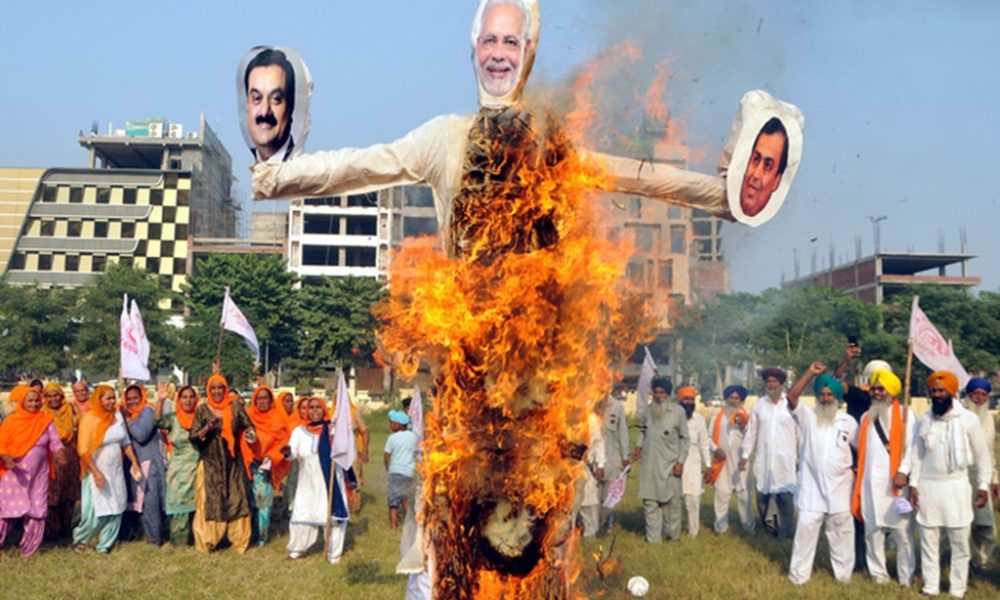 Farmers in India Burn Effigy of Modi Over Brutal Attacks from Police