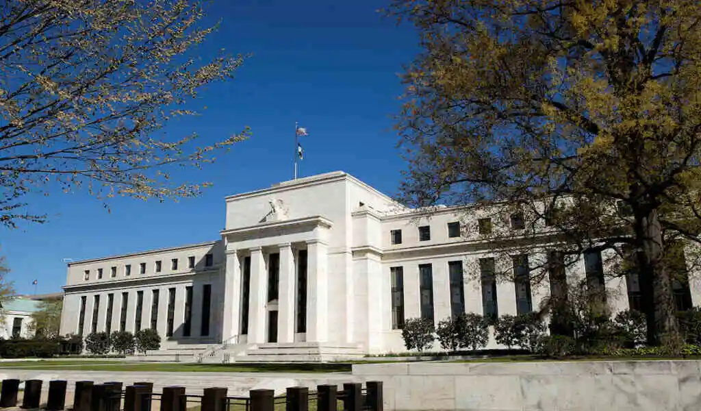 Despite Sticky Inflation, The Fed Expects Three Rate Cuts In 2024