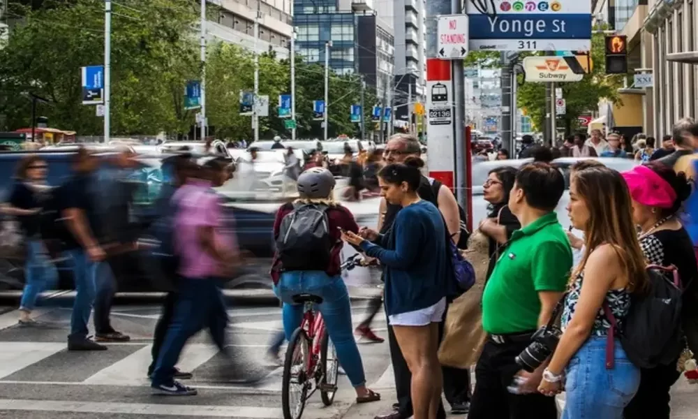 Canada's Record Population Growth in 2023 Driven by Immigration Sparks Economic Concerns