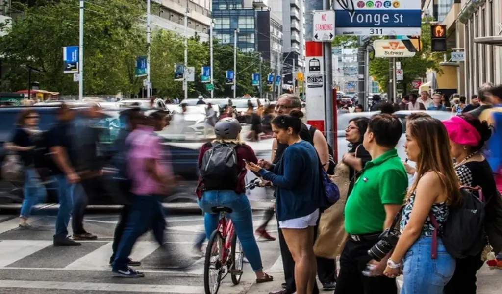 Canada's Record Population Growth in 2023 Driven by Immigration Sparks Economic Concerns