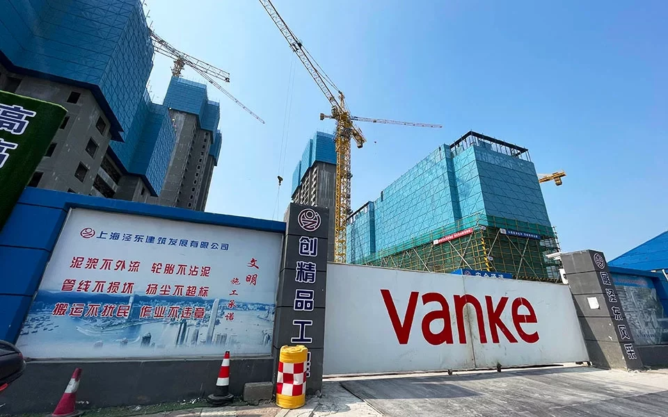 Vanke Downgraded to “Junk” Status