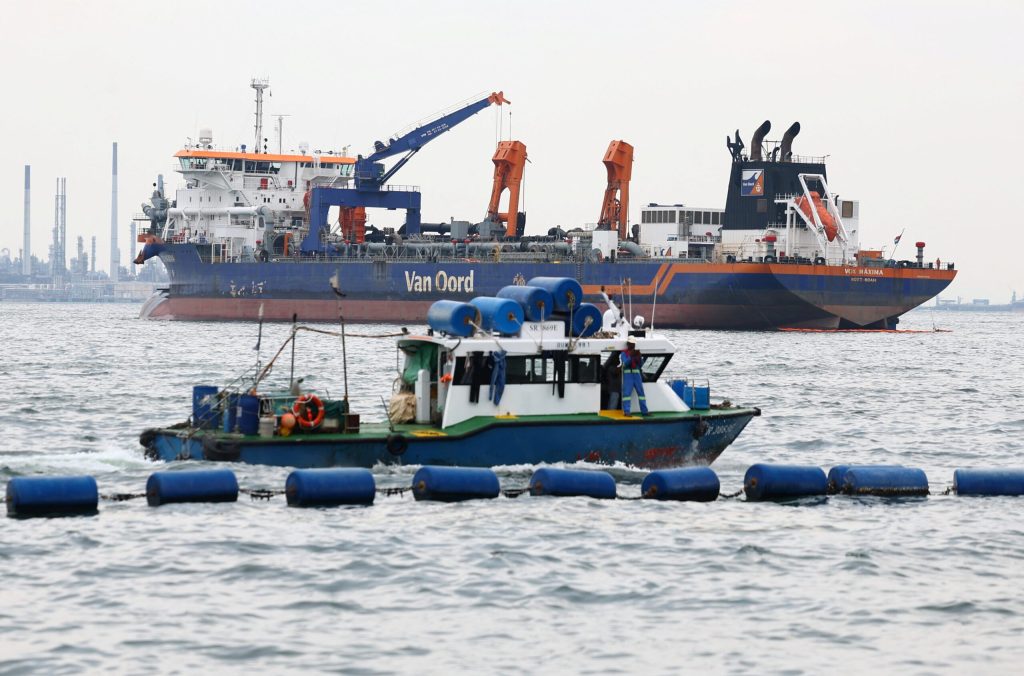 Dredger Collides with Singapore Oil Tanker